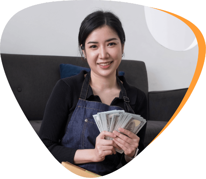 girl holding dollars