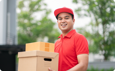 man holding two boxes