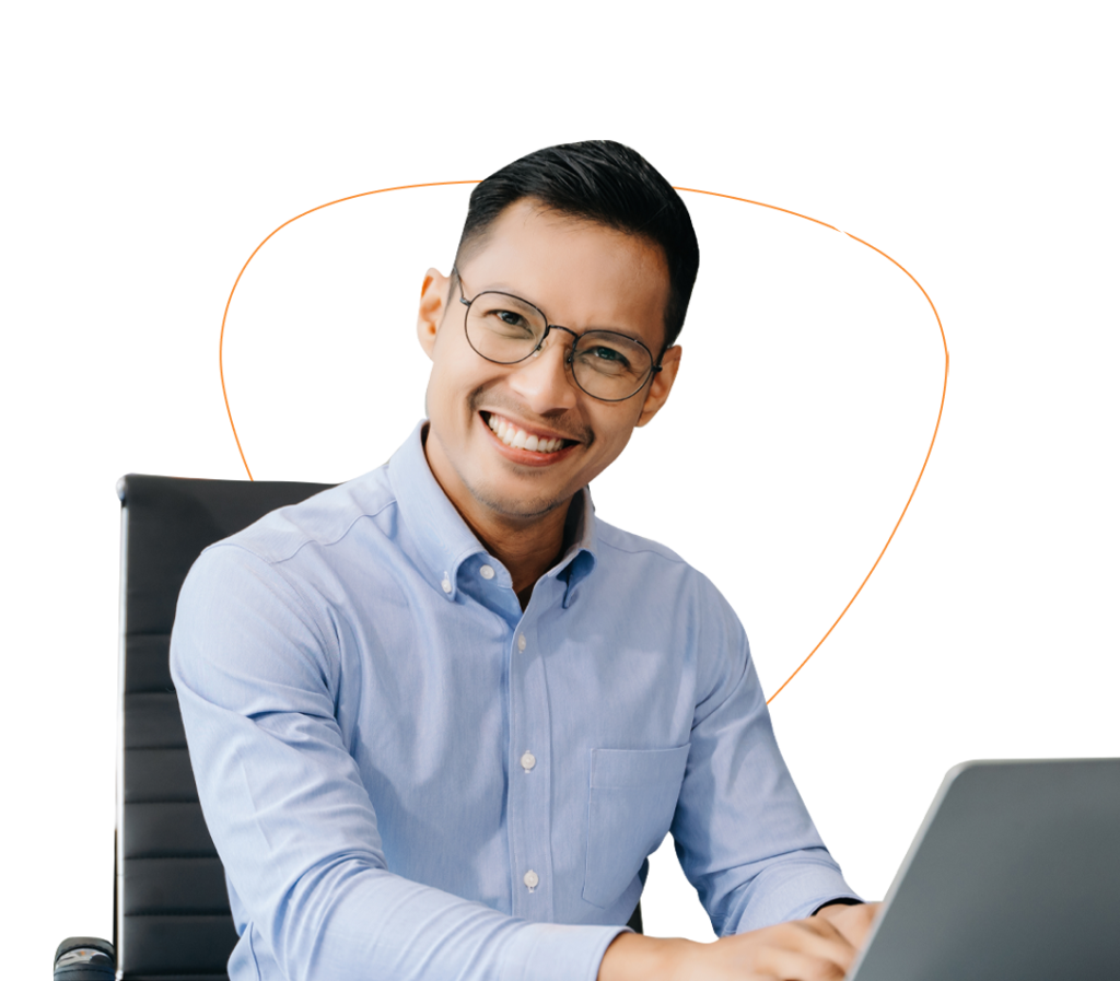 a logistics expert typing on a laptop