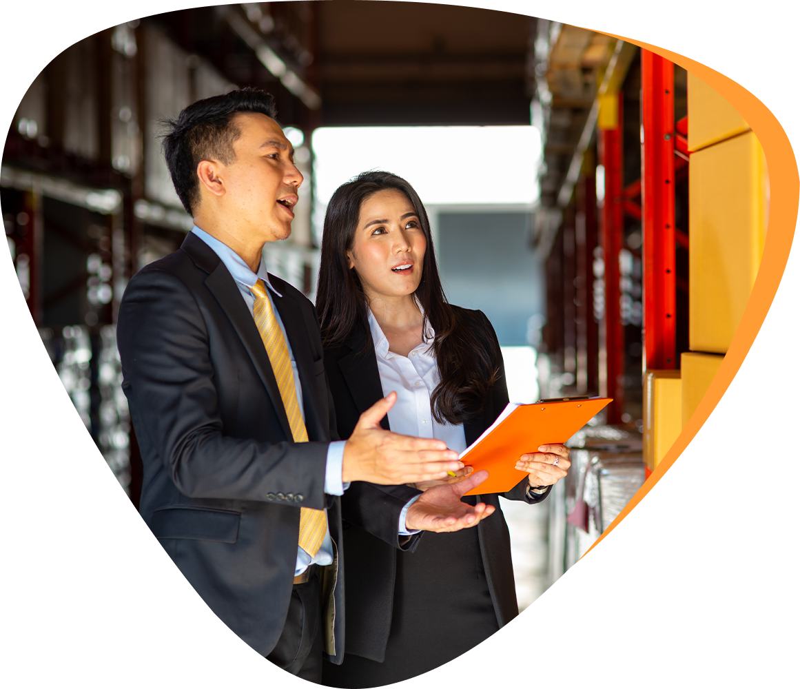 two logistics experts checking orders