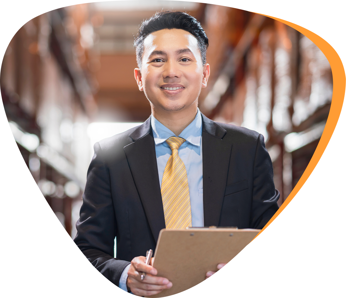 a logistics expert smiling in the background