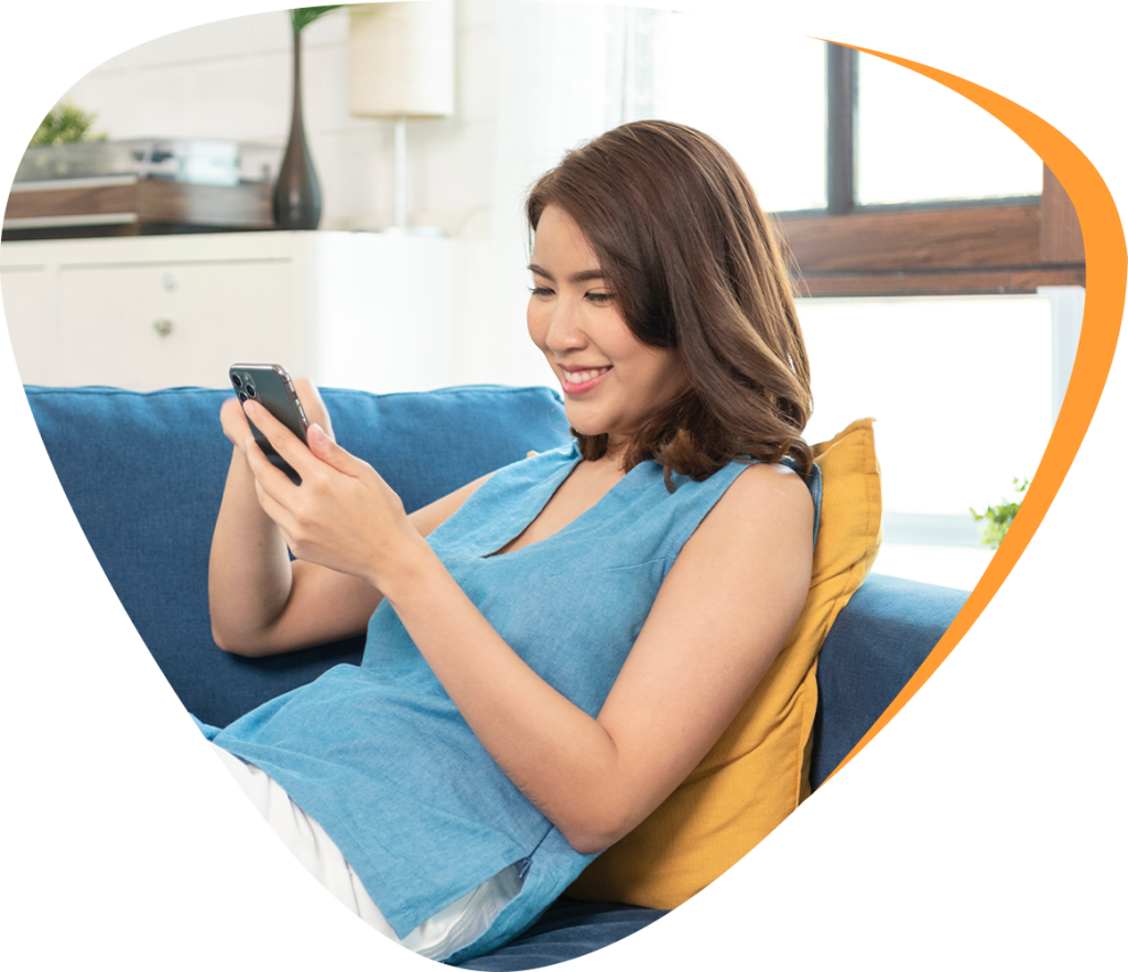 woman looking at something in her phone